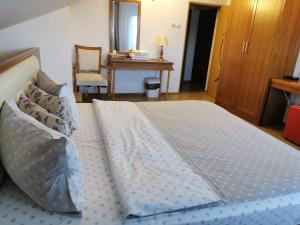Postel nebo postele na pokoji v ubytování Casa Lac de Verde