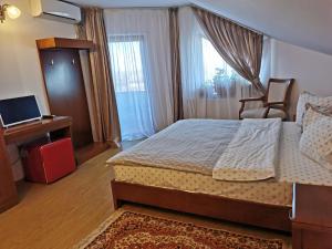 Postel nebo postele na pokoji v ubytování Casa Lac de Verde