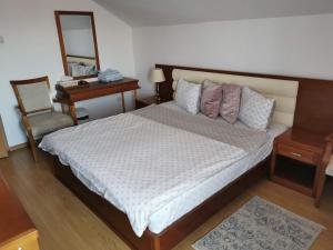 Postel nebo postele na pokoji v ubytování Casa Lac de Verde