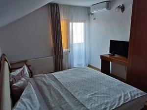 Postel nebo postele na pokoji v ubytování Casa Lac de Verde