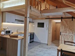 Apartmány Nová duha Vavřinec 주방 또는 간이 주방