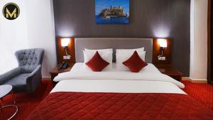 Letto o letti in una camera di Muscat Express Hotel