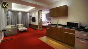 TV o dispositivi per l'intrattenimento presso Muscat Express Hotel