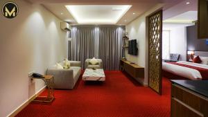 Letto o letti in una camera di Muscat Express Hotel