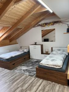Apartmány Nová duha Vavřinec 객실 침대