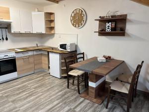 Apartmány Nová duha Vavřinec 주방 또는 간이 주방