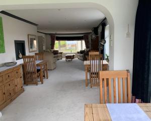 Гостиная зона в Ramsey House - Luxury Licensed B&B - Parking and Guest Lounge