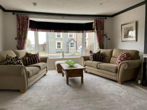 Гостиная зона в Ramsey House - Luxury Licensed B&B - Parking and Guest Lounge