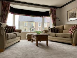 Гостиная зона в Ramsey House - Luxury Licensed B&B - Parking and Guest Lounge