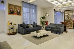 Area soggiorno di Muscat Express Hotel