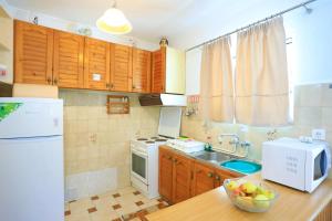 Dapur atau dapur kecil di Alexandra Apartment
