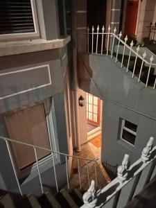 an overhead view of a staircase in a house at Gorgeous 2 floor 3 bed Apartment in St. Leonards