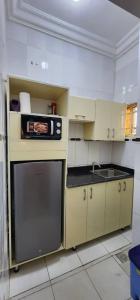 Dapur atau dapur kecil di Greys Onebedroom Apartment