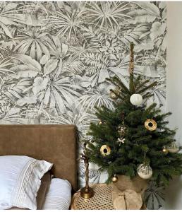 Postel nebo postele na pokoji v ubytování ForRest Suites