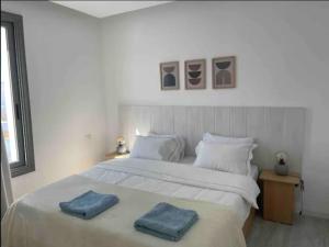 A bed or beds in a room at 3bedroom apartment with a private pool