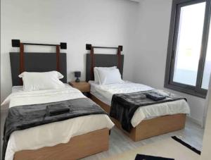 A bed or beds in a room at 3bedroom apartment with a private pool
