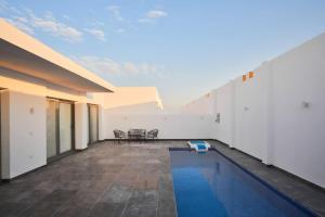 The swimming pool at or close to 3bedroom apartment with a private pool