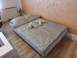 Katil atau katil-katil dalam bilik di Apartman Centar