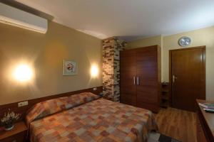 Ένα ή περισσότερα κρεβάτια σε δωμάτιο στο Cosy room in the center of Bansko
