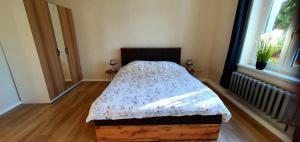 A bed or beds in a room at Vogtlandperle