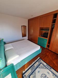 A bed or beds in a room at Casa Parido