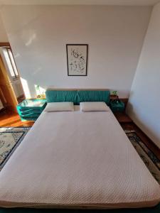 A bed or beds in a room at Casa Parido