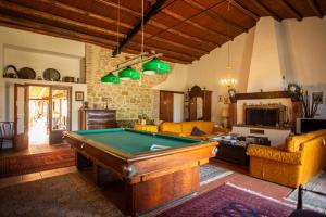 a living room with a pool table in it at Agriturismo Casalicchio in Cammarata