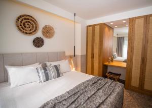 Postel nebo postele na pokoji v ubytování Kaktus Suites Private Pool + 37 fotografií