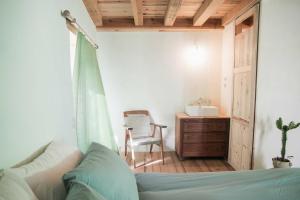 Łóżko lub łóżka w pokoju w obiekcie Eco lodge Carbonaccio