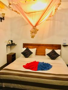 Een bed of bedden in een kamer bij Ella HIDE VIEW
