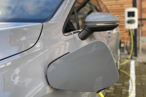 a close up of the side view mirror of a white car at Country Hotel Timmendorfer Strand in Timmendorfer Strand
