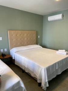 Cama o camas de una habitación en Flat 708 no Hotel Ilusion