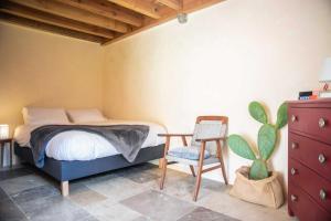 Łóżko lub łóżka w pokoju w obiekcie Eco lodge Carbonaccio