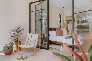 Voodi või voodid majutusasutuse Sendero Hotel toas