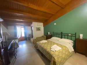 Tempat tidur dalam kamar di Fermata Spuligni - Turismo Rurale