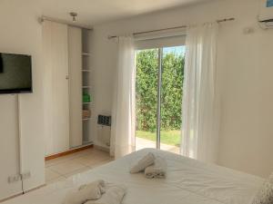 Postel nebo postele na pokoji v ubytování Good Life Resort + 37 fotografií