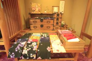 Llit o llits en una habitació de Shikanoyu Hotel