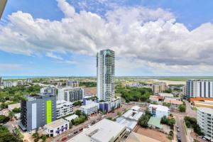 an aerial view of a city with tall buildings at Luxury two-beds harbour views apartment in Darwin