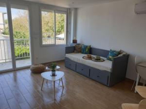 Posezení v ubytování Studio refait à neuf Ave St Maurice