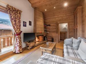 Appartement Megève, 4 pièces, 6 personnes - FR-1-453-6にあるシーティングエリア