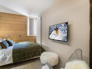 Кровать или кровати в номере Appartement Megève, 3 pièces, 5 personnes - FR-1-453-81