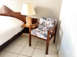 Ein Sitzbereich in der Unterkunft L'Hôtel Du Fleuve