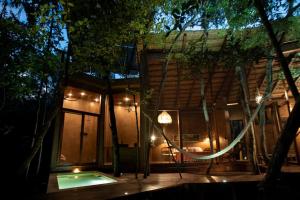 Bazén v ubytování OJO DE AGUA. Design+pool. Vive la auténtica selva! nebo v jeho okolí