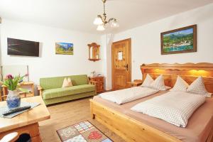 Postel nebo postele na pokoji v ubytování Landhaus Maltermoos