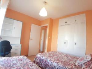 Postel nebo postele na pokoji v ubytování Apartamento Ángel