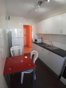 Kuchyň nebo kuchyňský kout v ubytování Apartamento Ángel