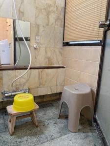 Een badkamer bij Marina Bay Atami