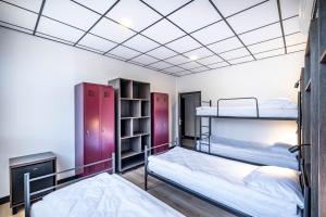 Postel nebo postele na pokoji v ubytování Vola Hostel