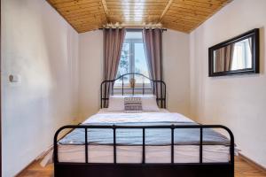 Posteľ alebo postele v izbe v ubytovaní Apartmány Pod Šerákem