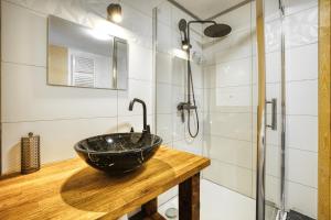 Kúpeľňa v ubytovaní Apartmány Pod Šerákem